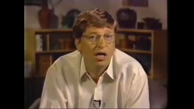 Microsoft co-founder Bill Gates on a giant screen at Mac World Expo 1997 in Boston